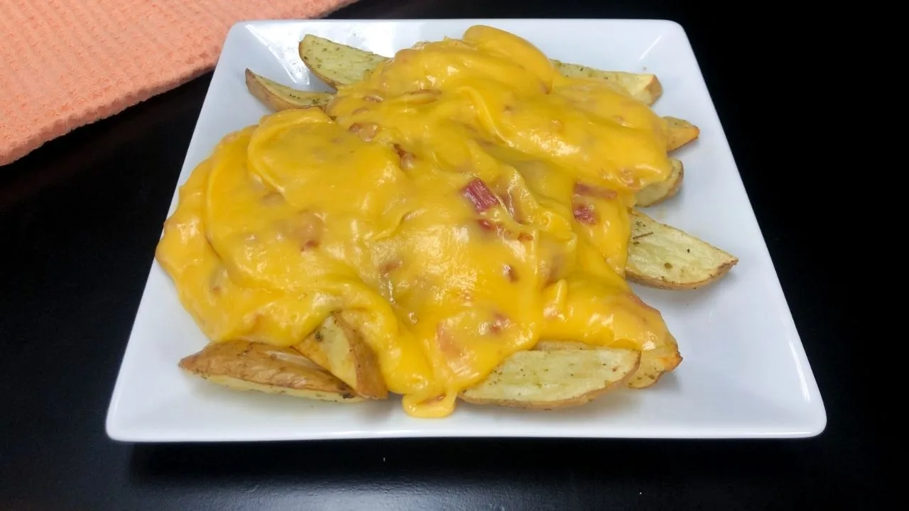 papa con queso cheddar
